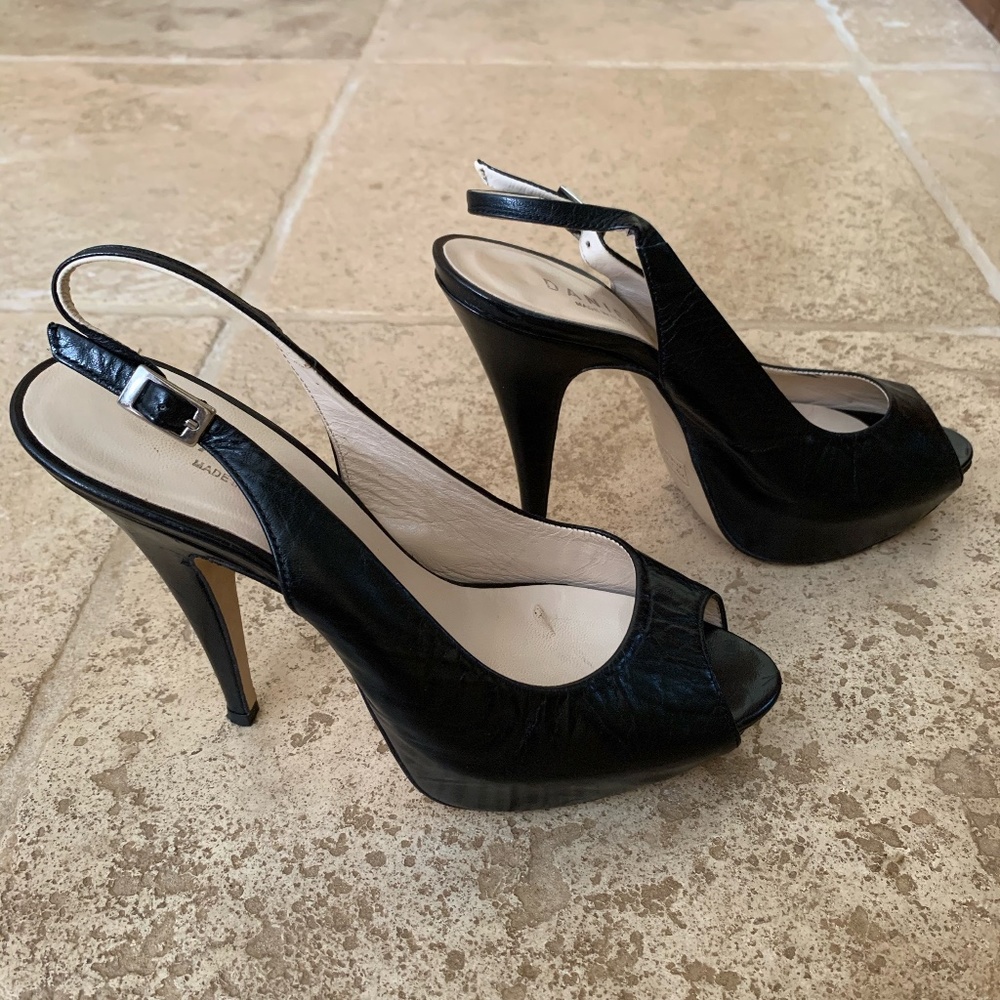 Daniel high heeled, peep toe sling backs.